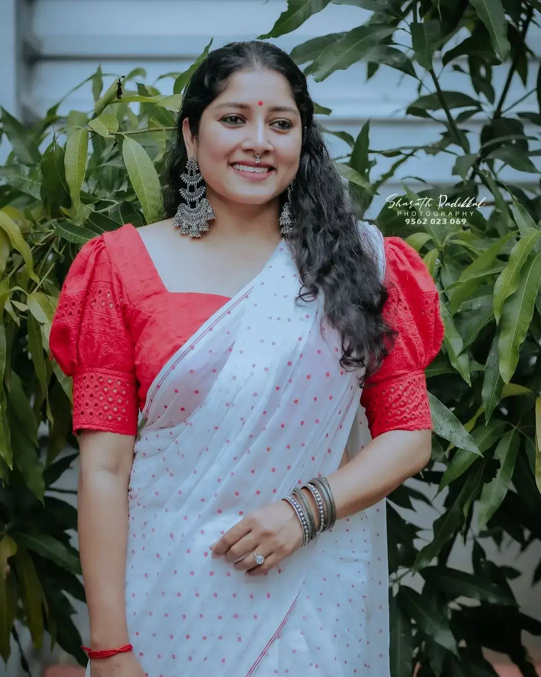 Anumol in White Saree Red Blouse